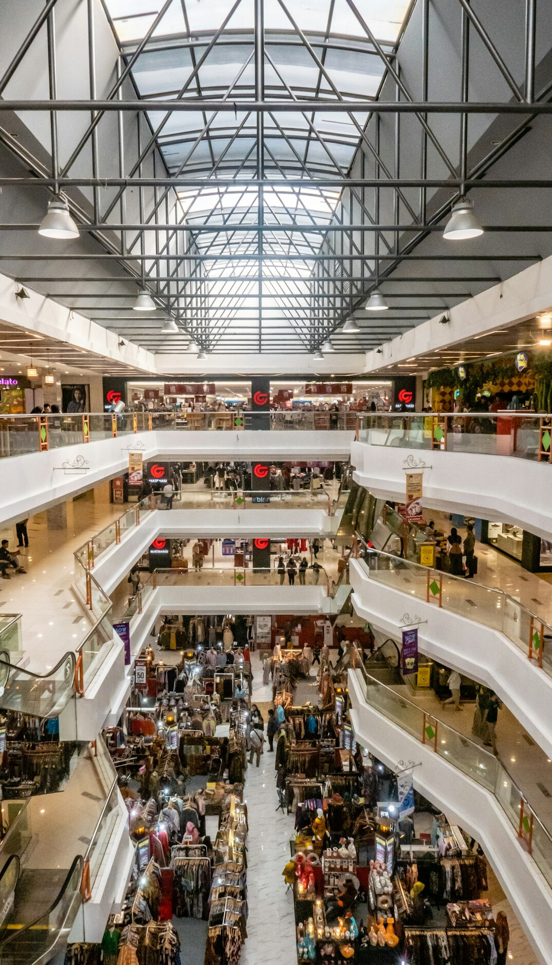 Interior of a busy retail store with customers